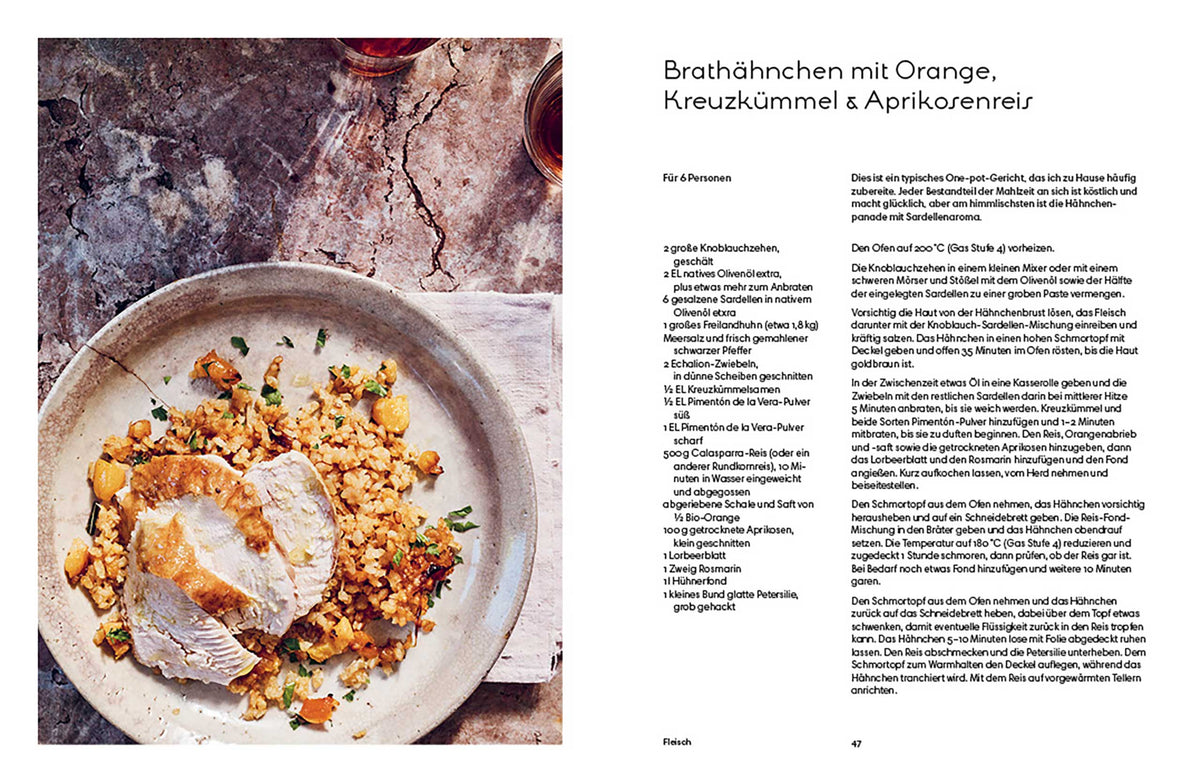 Teller mit Hähnchenscheiben, Orange und Aprikosenreis, daneben Geschenkset Andalusien und Text.