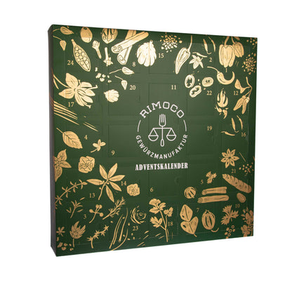 Bio Gewürz Adventskalender mit grünem Rand und goldenen Abbildungen von Kräutern, Gemüse und Gewürzen.