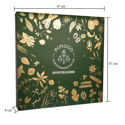Bio Gewürz Adventskalender in Grün und Gold mit Abbildungen von Gewürzen auf der Vorderseite.