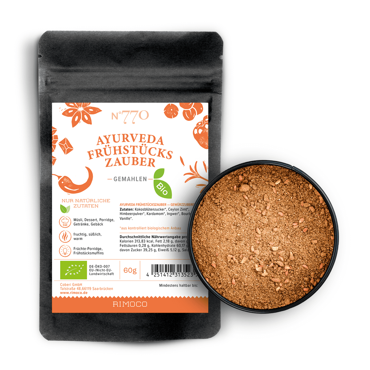 Bio Ayurveda Frühstückszauber Gewürzmischung im Beutel und in einer Schale, orange-weißes Etikett.