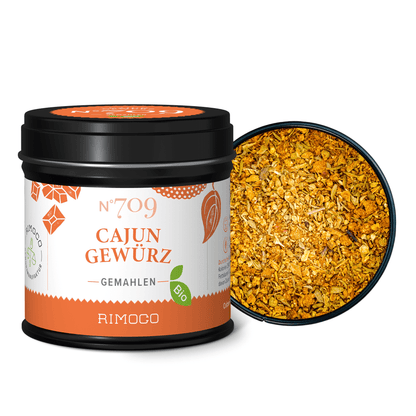 Bio Cajun Gewürz in geöffneter runder Dose, zeigt die gelbe Gewürzmischung.