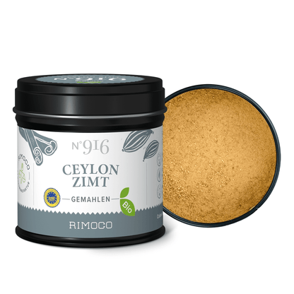Offene Dose mit gemahlenem Bio Ceylon Zimt, daneben liegt der Deckel.