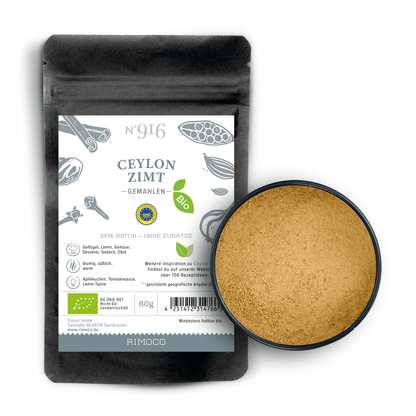 Bio Ceylon Zimt Packung mit einem Schale gemahlenem Zimt auf weißem Hintergrund.