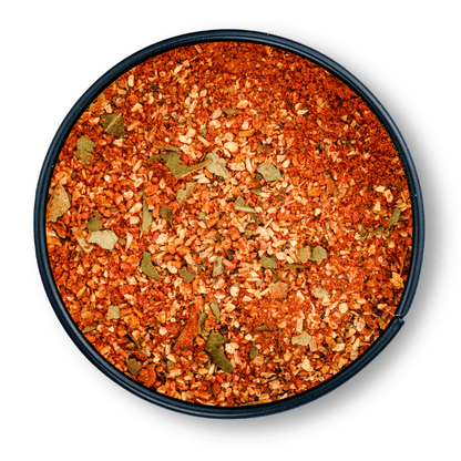 Runde schwarze Dose Bio Fruity Tofu Gewürz mit sichtbarer bunter Mischung getrockneter Kräuter.