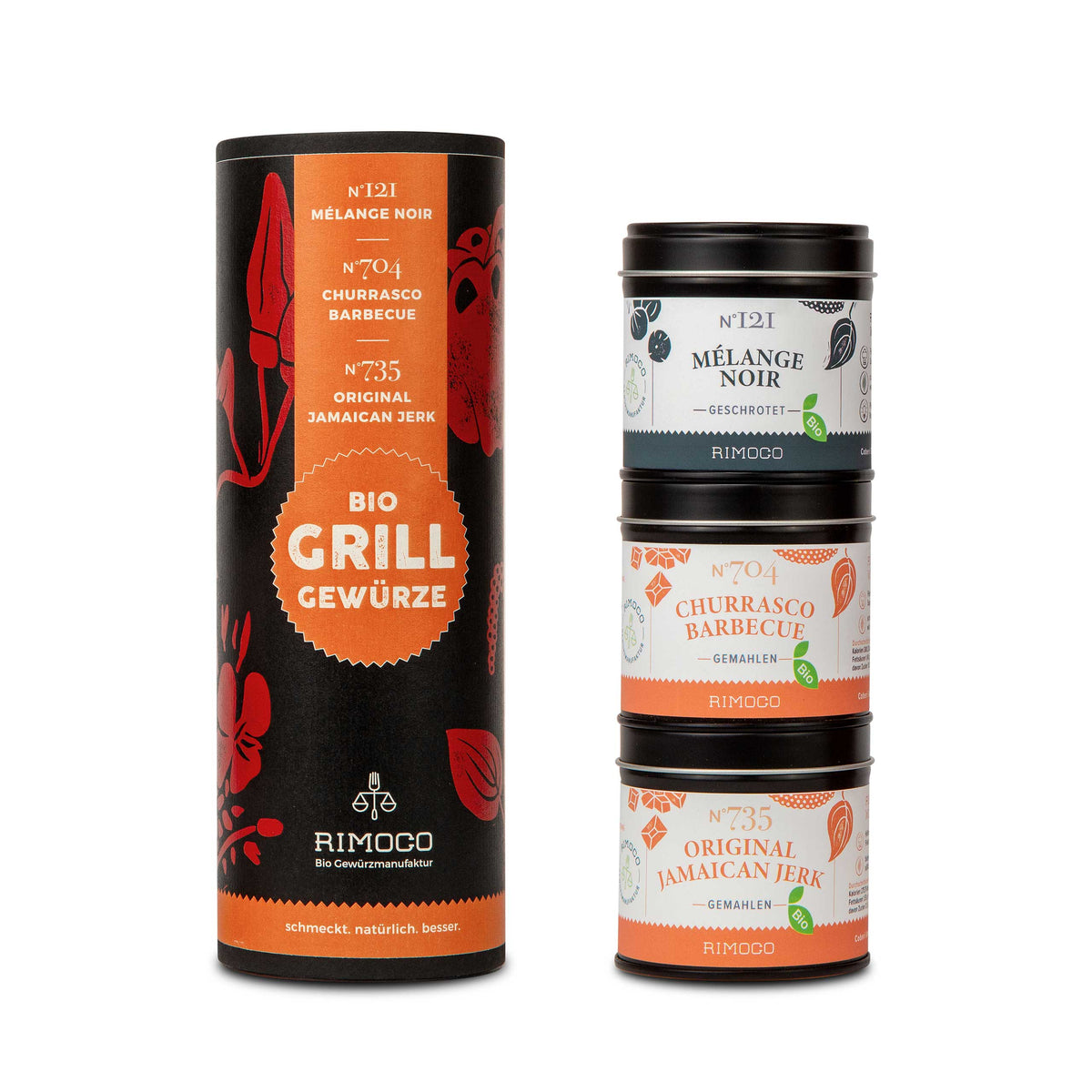 Drei Gewürzgläser mit gemahlenen Mischungen in einem hohen Behälter, Grillgewürze Set sichtbar.