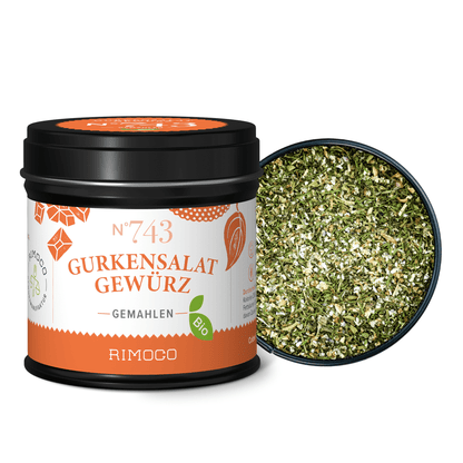 Geöffnete Dose mit Bio Gurkensalat Gewürz, darin sichtbar gehackte Dillspitzen.