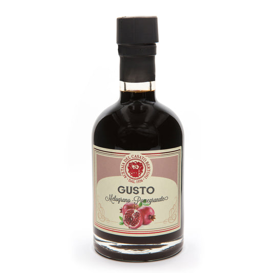 Bertoni Granatapfel-Balsamico Condimento Flasche mit Wachssiegel und Granatapfelbild auf dem Etikett.