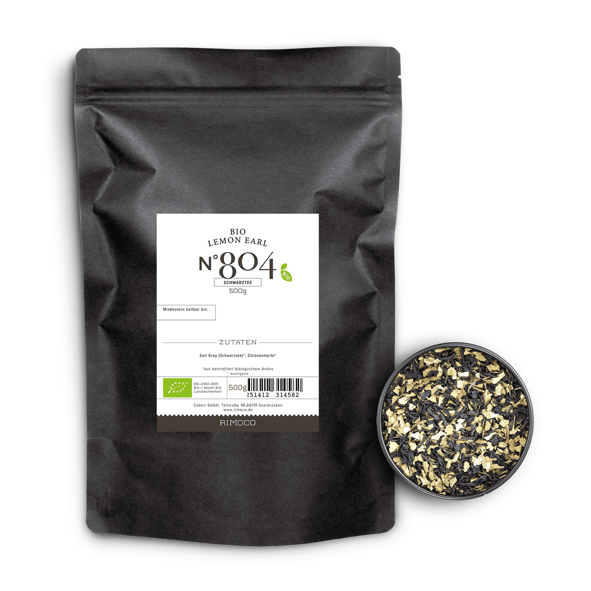 Bio Schwarztee Lemon Earl Teebeutel neben losen gelben und schwarzen Teeblättern.