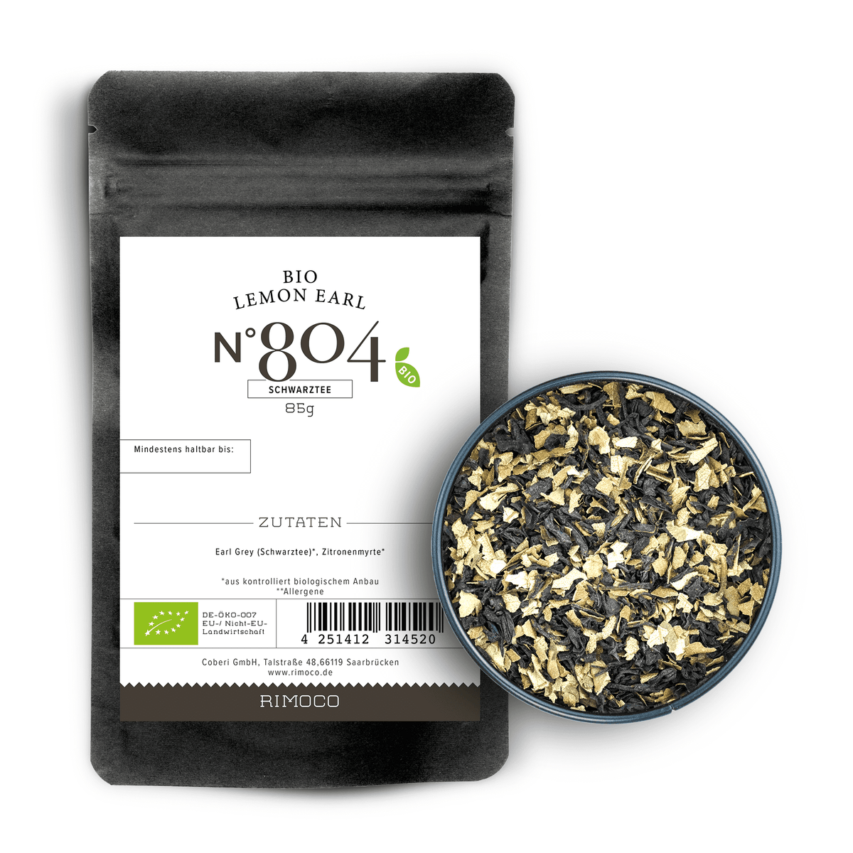 Bio Schwarztee Lemon Earl Teepackung und Schale mit Tee von oben gesehen.