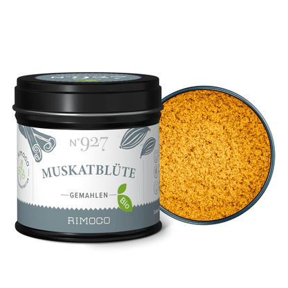 Schwarze Dose Bio Muskatblüte gemahlen mit offenem Deckel, gemahlenes Gewürz sichtbar.