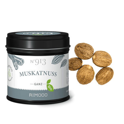 Dose Bio Muskatnuss ganz N°913, daneben fünf ganze Muskatnüsse.