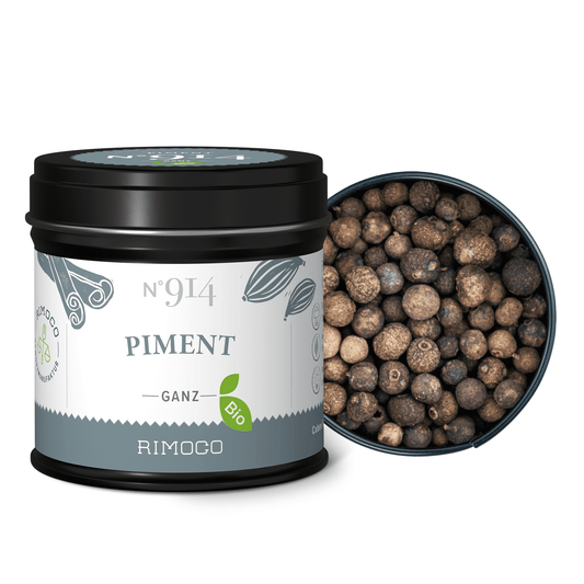 Bio Piment Dose mit ganzen Nelkenpfefferkörnern, eine geöffnet und der Inhalt sichtbar.