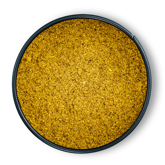 Bio Ras el Hanout, runder Behälter von oben auf weißem Hintergrund.