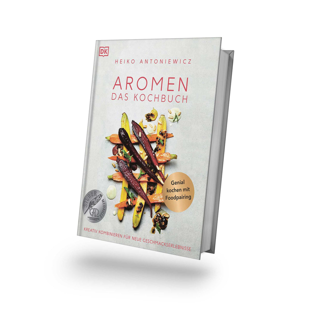 Geschenkset Aromen - Das Kochbuch mit buntem Gemüse und Bio Ras El Hanout in gemahlener Form.