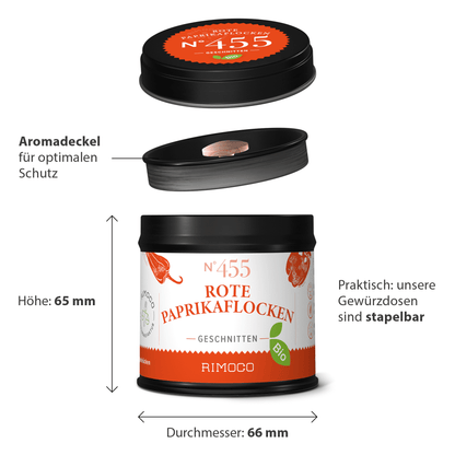 Bio Rote Paprikaflocken in runder Dose mit Deckel, beschriftet, vollständige Verpackung sichtbar.