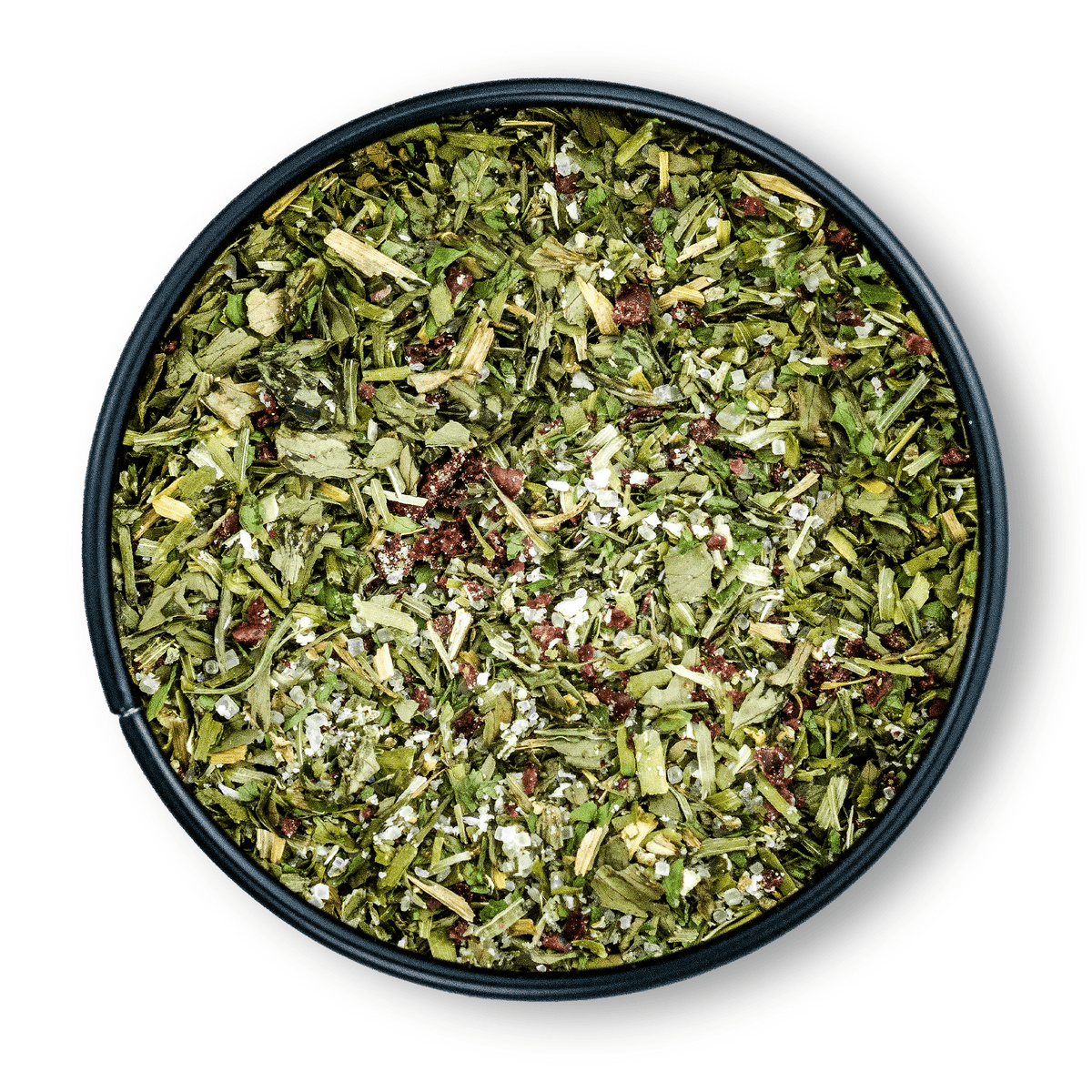 Runde Dosis Bio Salatgewürz mit grünem, getrocknetem Kräuter-Gewürz-Mix von oben gesehen.