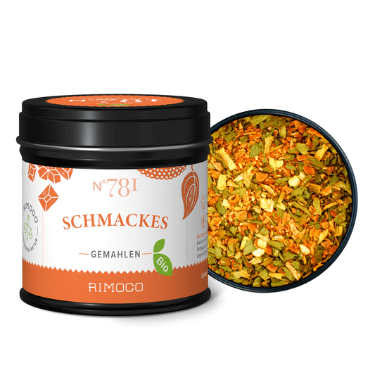 Dose Bio Schmackes mit bunter, grober Gewürzmischung daneben.