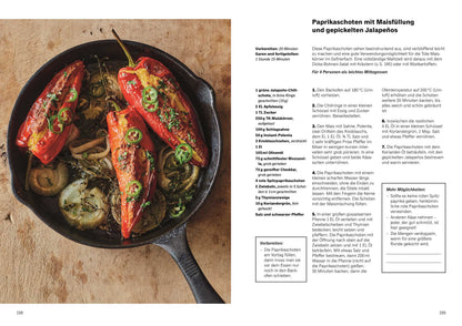 Gefüllte rote Paprika mit Mais, Jalapeños und Kräutern in einer Pfanne.