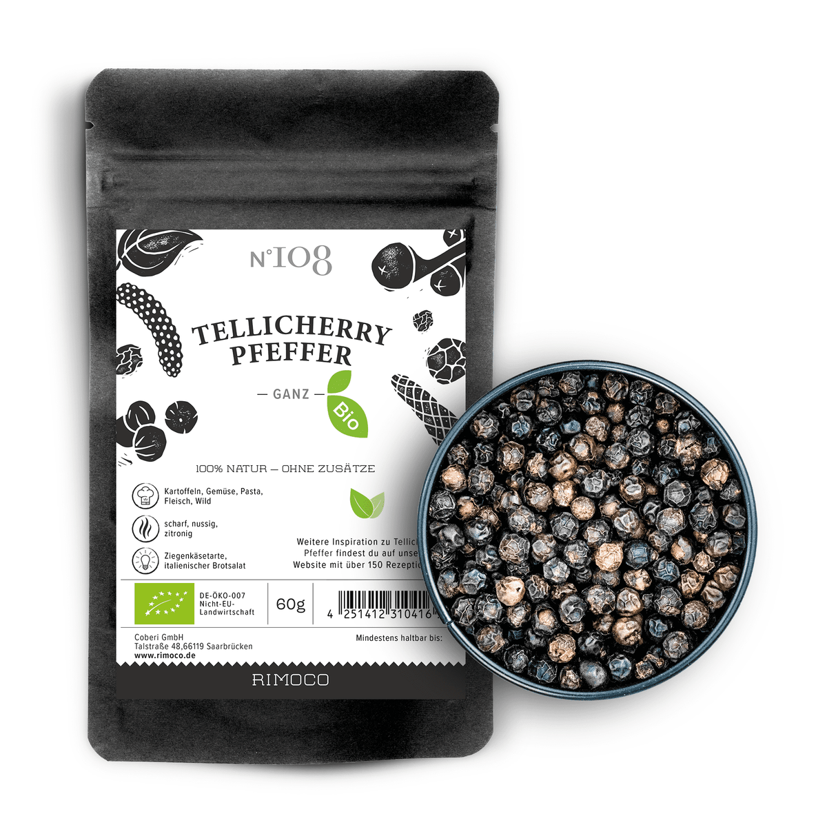 Bio Tellicherry Pfeffer ganz in einer kleinen Schale neben einer Packung mit dem gleichen Namen.