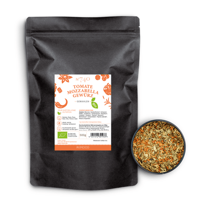 Bio Tomate Mozzarella Gewürz neben einer Schale mit grobem Caprese-Kräutermix.