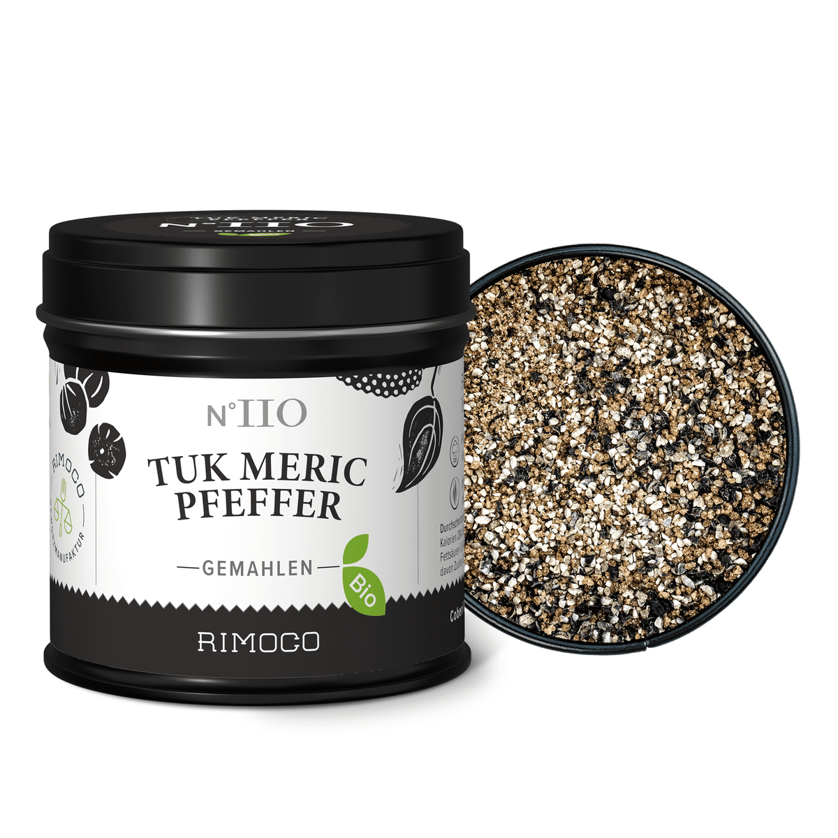 Schale mit grob gemahlenem schwarzem und weißem Pfeffer, daneben Bio Tuk Meric Pfefferbehälter.