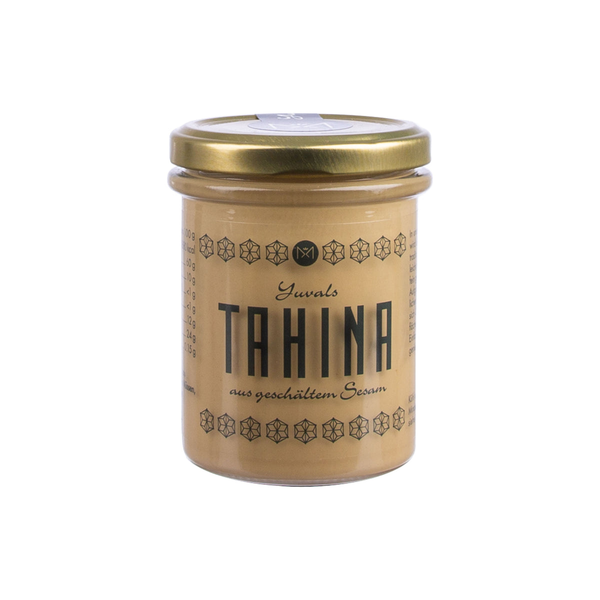 Ottolenghi Profi-Set Glas mit goldenem Deckel, schwarzem Etikett und Granatapfeldicksaft auf Weiß.