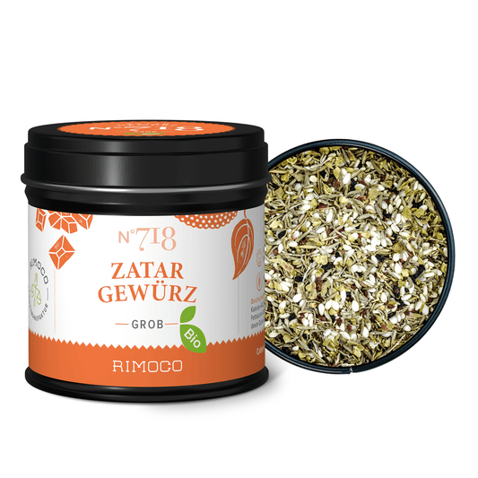 Bio Zatar Gewürz in geöffneter Dose mit abgenommenem Deckel, Kräutermischung sichtbar.